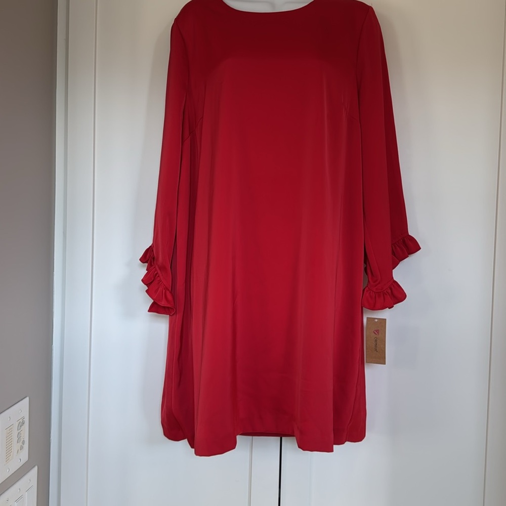 Cremieux red dress with ruffle sleeve on bottom.